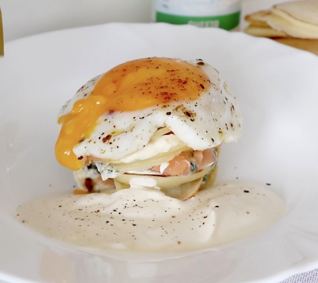 Blines with creamy sauce, salmon and spinach
