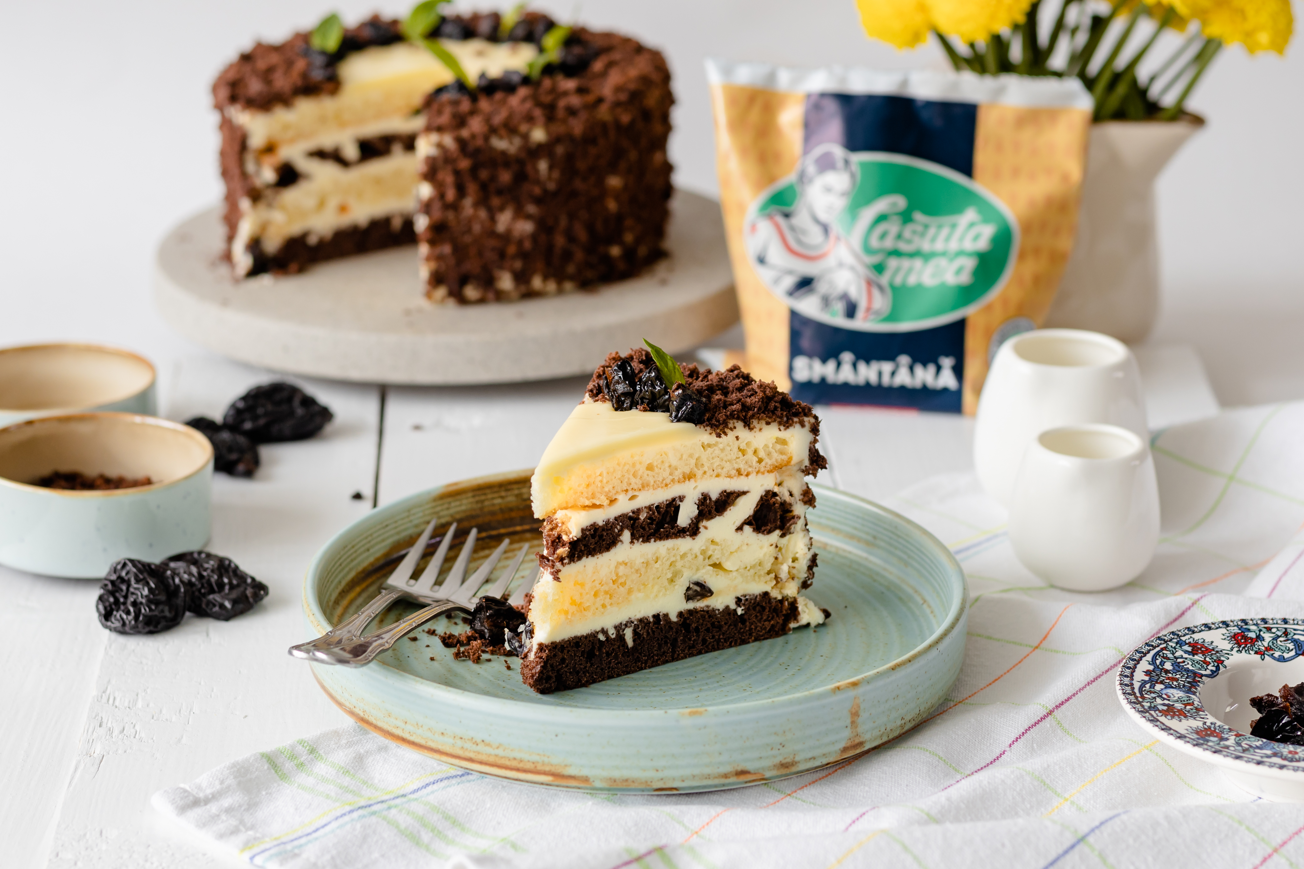 Cream cake with plums in syrup